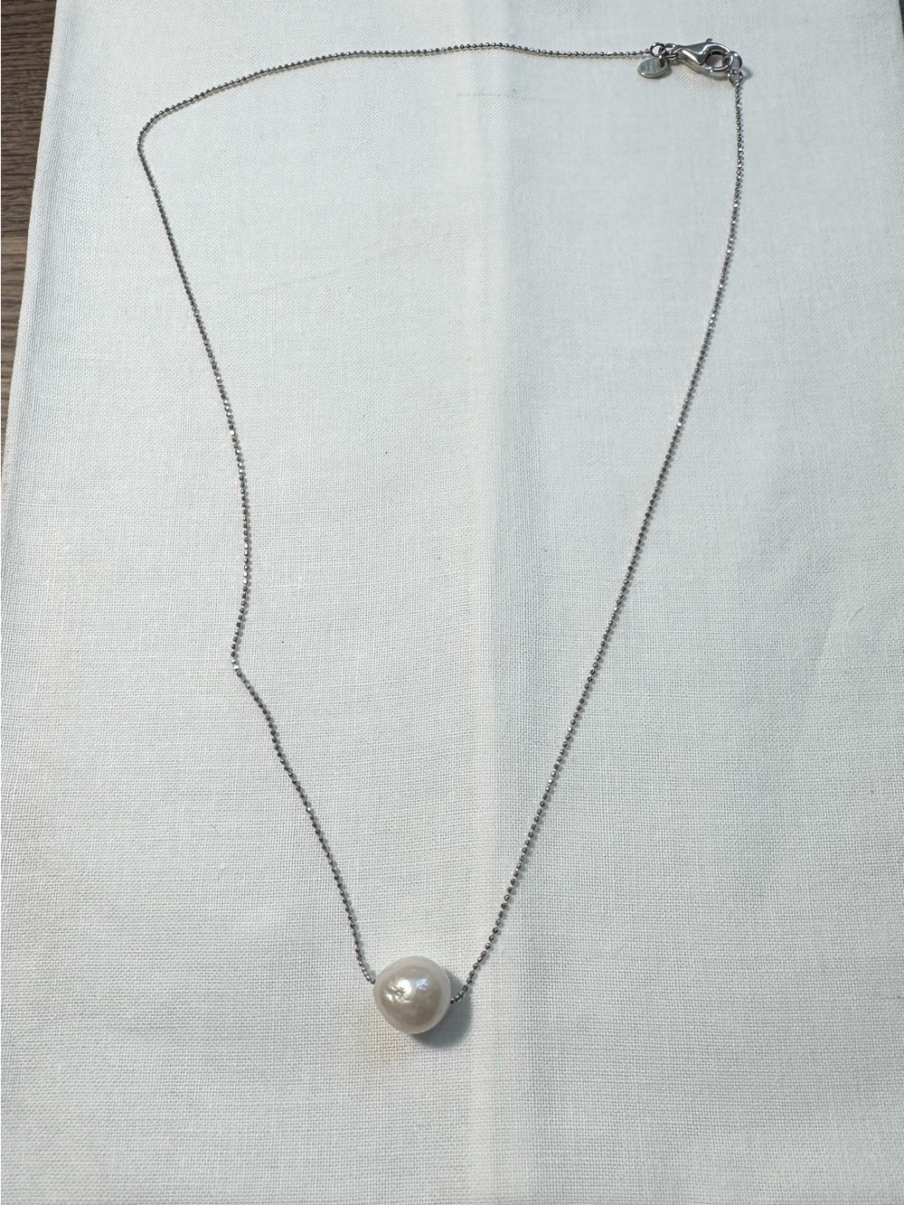 Floating pearl necklace on sterling silver chain